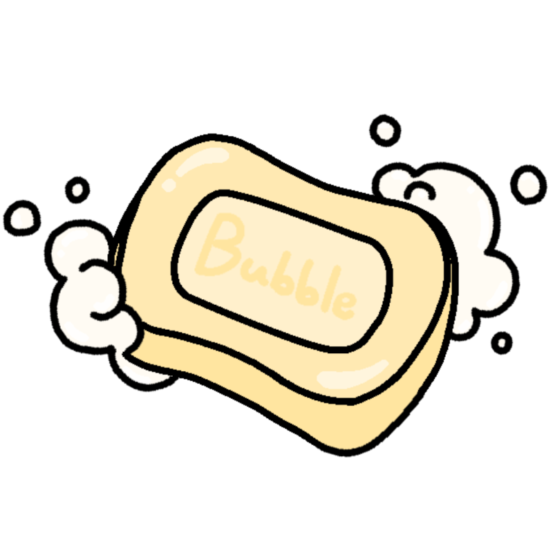 a cream colored rectangular bar of soap that reads 'bubble' across it with bubbles on the bottom left and top right corners.